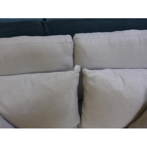 1517 - An extra deep taupe upholstered two seater sofa