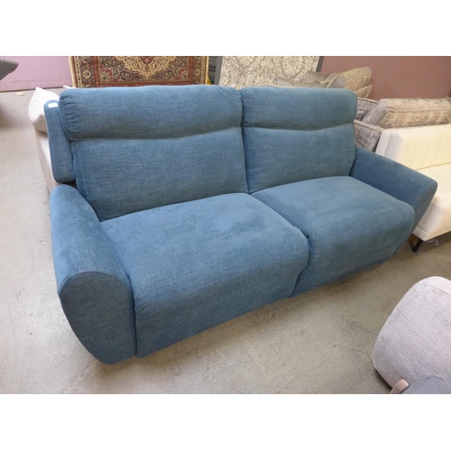 1519 - A teal blue upholstered dual electric reclining sofa RRP £1799