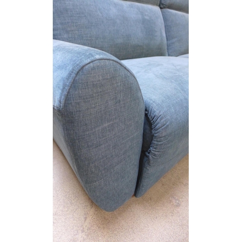 1519 - A teal blue upholstered dual electric reclining sofa RRP £1799