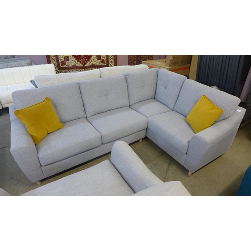 1526 - A grey upholstered corner sofa