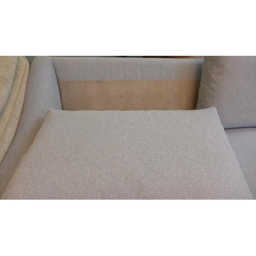 1529 - A grey upholstered three seater sofa