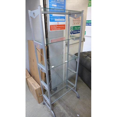 1588 - A glass and steel shelf unit