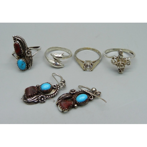 1003 - A silver stone set ring, Q, and matching earrings set and three silver rings, M, N and Q