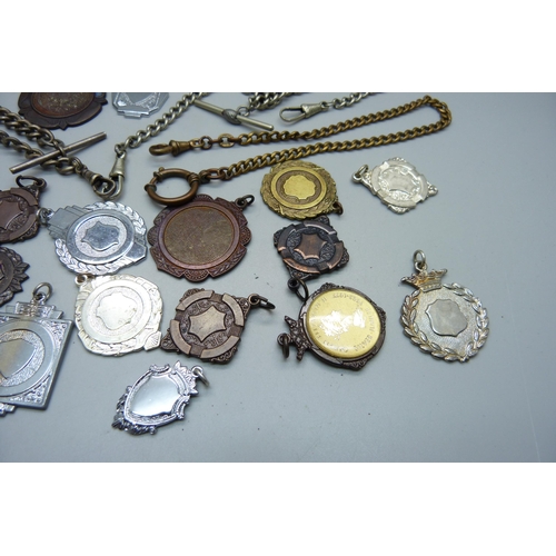 1007 - A collection of Albert pocket watch chains and fob medals