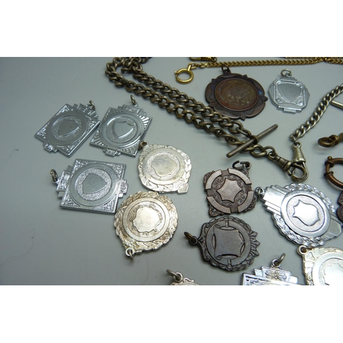 1007 - A collection of Albert pocket watch chains and fob medals