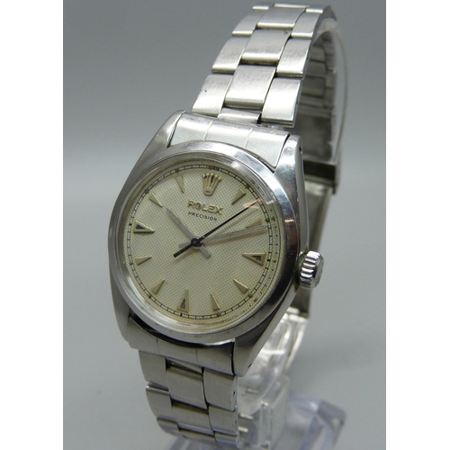 1015 - A 1936 Rolex Precision wristwatch, 33mm case, the bracelet numbered 361, (serviced six months ago, w... 