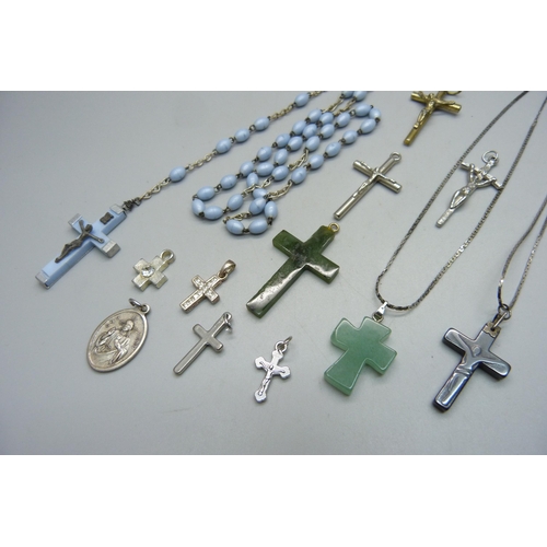 1017 - Ten cross pendants, a St. Christopher pendant and a set of rosary beads