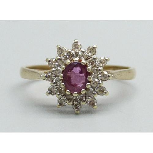 1029 - A 9ct gold, ruby and diamond cluster ring, 2.6g, R