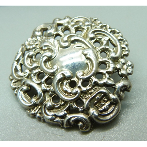 1044 - A cased set of six Victorian ornate silver buttons, Birmingham 1900, by Levi and Salaman, 28mm