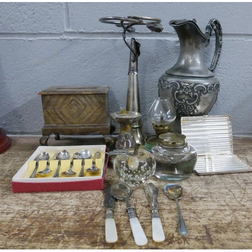 1055 - A pewter ewer, plated posy vase, cigarette case and cutlery and a cigarette box, serpentine sun dial... 