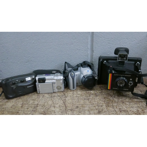 1063 - Four cameras, Pentax, Polaroid, Minolta and Panasonic **PLEASE NOTE THIS LOT IS NOT ELIGIBLE FOR POS... 