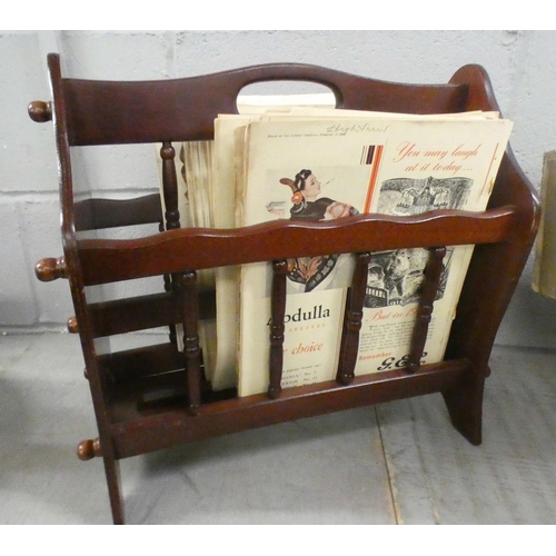 1083 - A collection of Punch publications, 1940s, in a magazine rack **PLEASE NOTE THIS LOT IS NOT ELIGIBLE... 