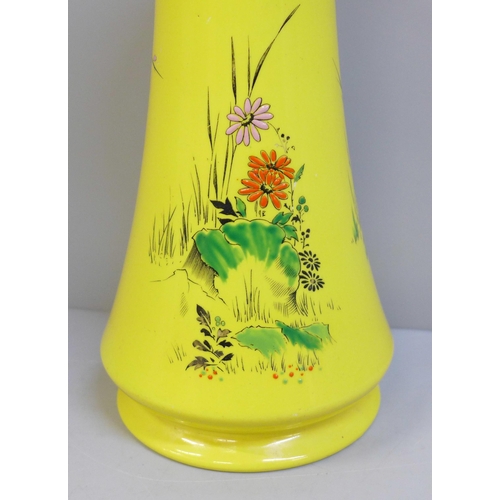 601 - A Shelley hand painted enamelled vase, 21cm