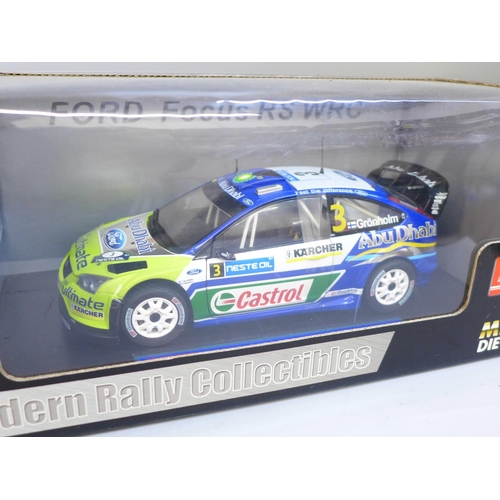 607 - Two Sun Star metal die-cast model vehicles; a Ford Focus WRC and Jaguar 140 Drophead Coupe, boxed