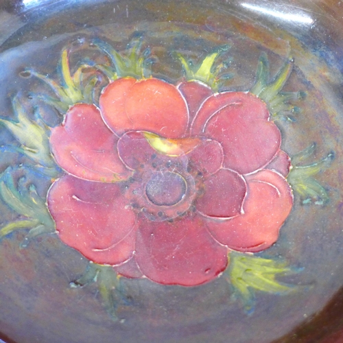 613 - An early 20th Century Moorcroft bowl, anemone pattern with flambe glaze, signed on the base, 23.5cm,... 