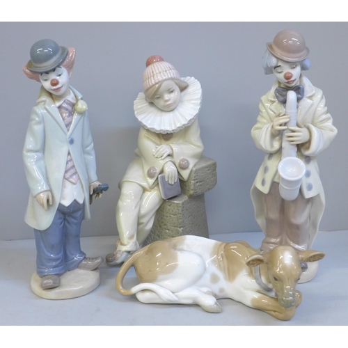 617 - Four Lladro figures including a model of a Nativity cow