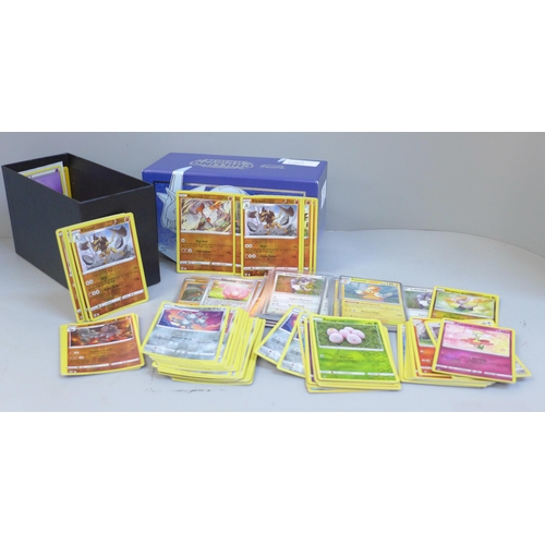 629 - A box of Pokemon cards with more than 150 holographic