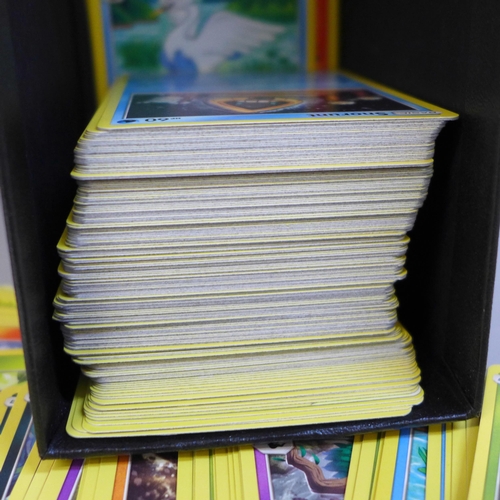 633 - Over 220 holographic Pokemon cards