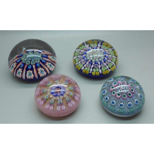 634 - Four Millefiori glass paperweights