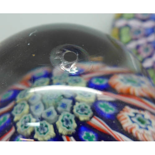 634 - Four Millefiori glass paperweights