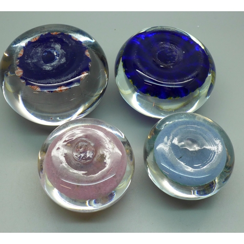 634 - Four Millefiori glass paperweights