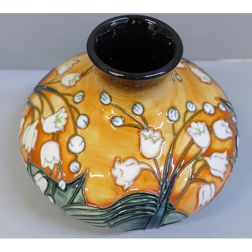 635 - A limited edition Moorcroft Lily of The Valley vase, 245/500, 10.5cm