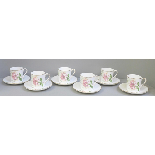 652 - Six Shelley coffee cans and saucers decorated with flowers