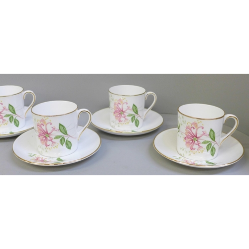 652 - Six Shelley coffee cans and saucers decorated with flowers