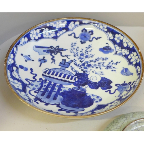 694 - A Chinese bowl with four character mark to base, a Chinese blue and white dish with six character ma... 