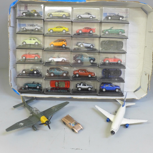 727 - Motoring; a box of twenty-four collectable cars and two Dinky Toys die-cast aeroplanes