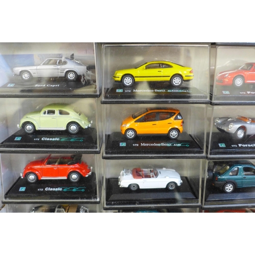 727 - Motoring; a box of twenty-four collectable cars and two Dinky Toys die-cast aeroplanes