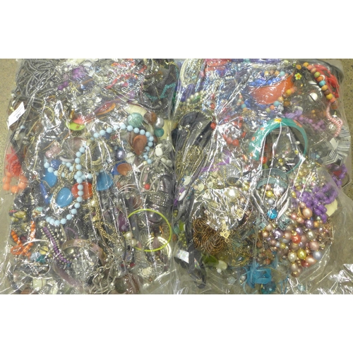 745 - Two large bags of costume jewellery