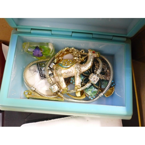 799 - A large box of costume jewellery