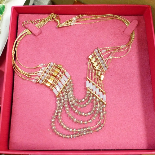 799 - A large box of costume jewellery