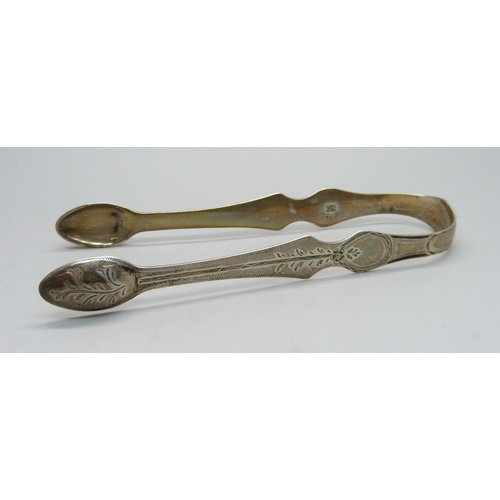 865A - A pair of 19th Century silver sugar bows, 34g