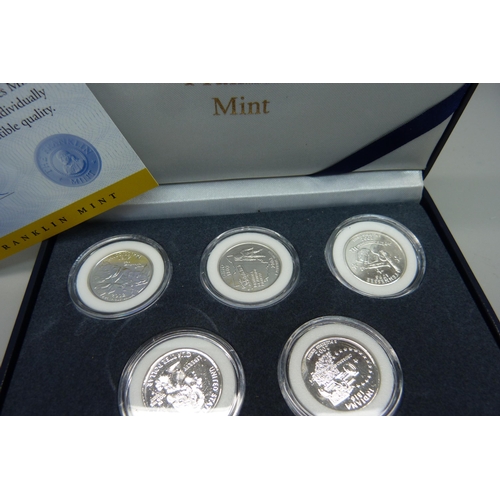 874 - A Franklin Mint United States Mint coin set, 5x 2002 State Quarter Dollar coins