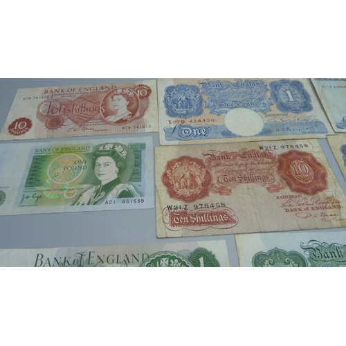 877 - A collection of eight British bank notes including ten shillings, one pound and five pounds