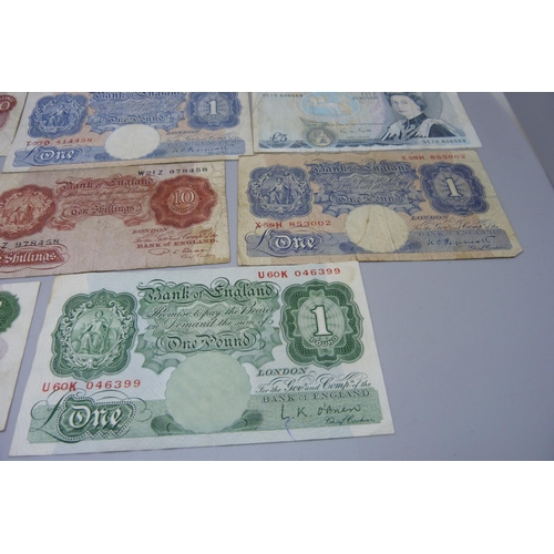 877 - A collection of eight British bank notes including ten shillings, one pound and five pounds