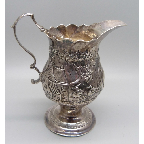 887 - A George III silver jug, London 1772, Ann Smith & Nathaniel Appleton, with later inscription dated 1... 