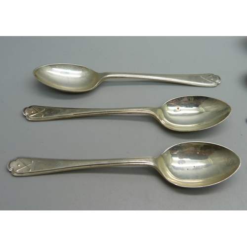 891 - Collectors spoons; including 102g of hallmarked silver and 36g of .800 silver