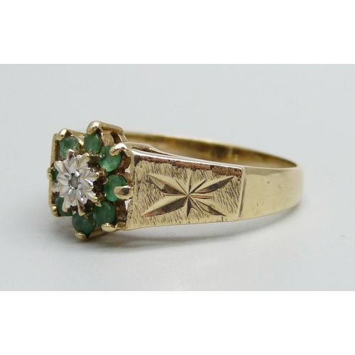 968 - A 9ct gold, emerald and diamond cluster ring, 3.4g, R