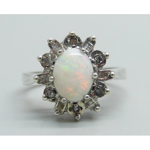 971 - A 9ct white gold, opal and diamond cluster ring, 3.9g, O