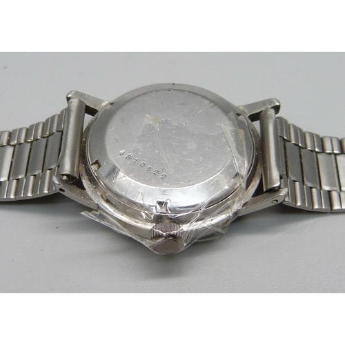 979 - An Eterna-Matic wristwatch, crown loose