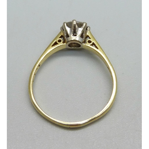 982 - An 18ct gold and diamond solitaire ring, round brilliant cut diamond, claw set in white gold with op... 