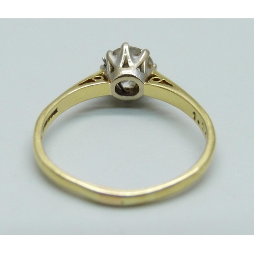 982 - An 18ct gold and diamond solitaire ring, round brilliant cut diamond, claw set in white gold with op... 