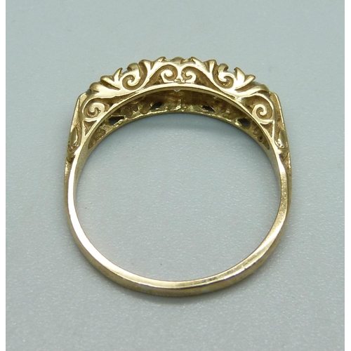 988 - A 9ct gold, five stone Victorian style ring, 2.6g, P