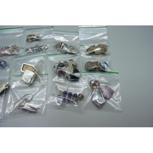 993 - Ten pairs of silver earrings, five silver pendants and chains and a silver bracelet