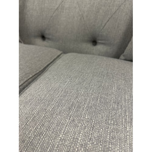 1469 - A grey upholstered Chesterfield two seater sofa