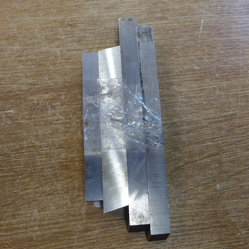 2143 - Four lengths of high speed steel unused