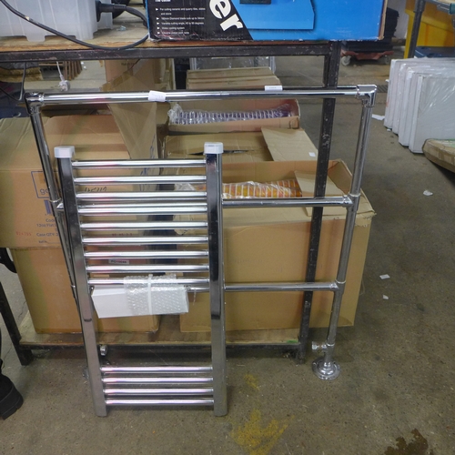 2355 - Two unused chrome ladder radiators, one set of valves and a roll of 15mm plastic pipe